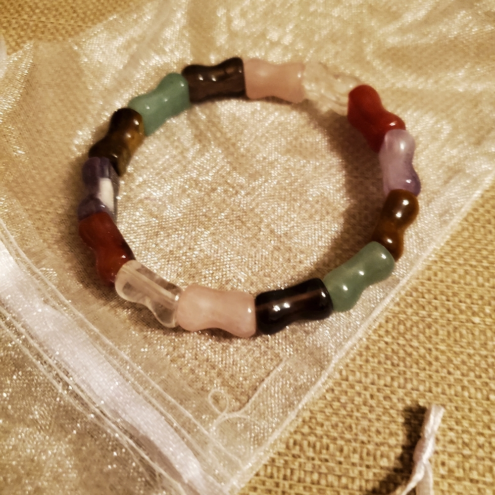 Costume style jade colored tube bead bracelet